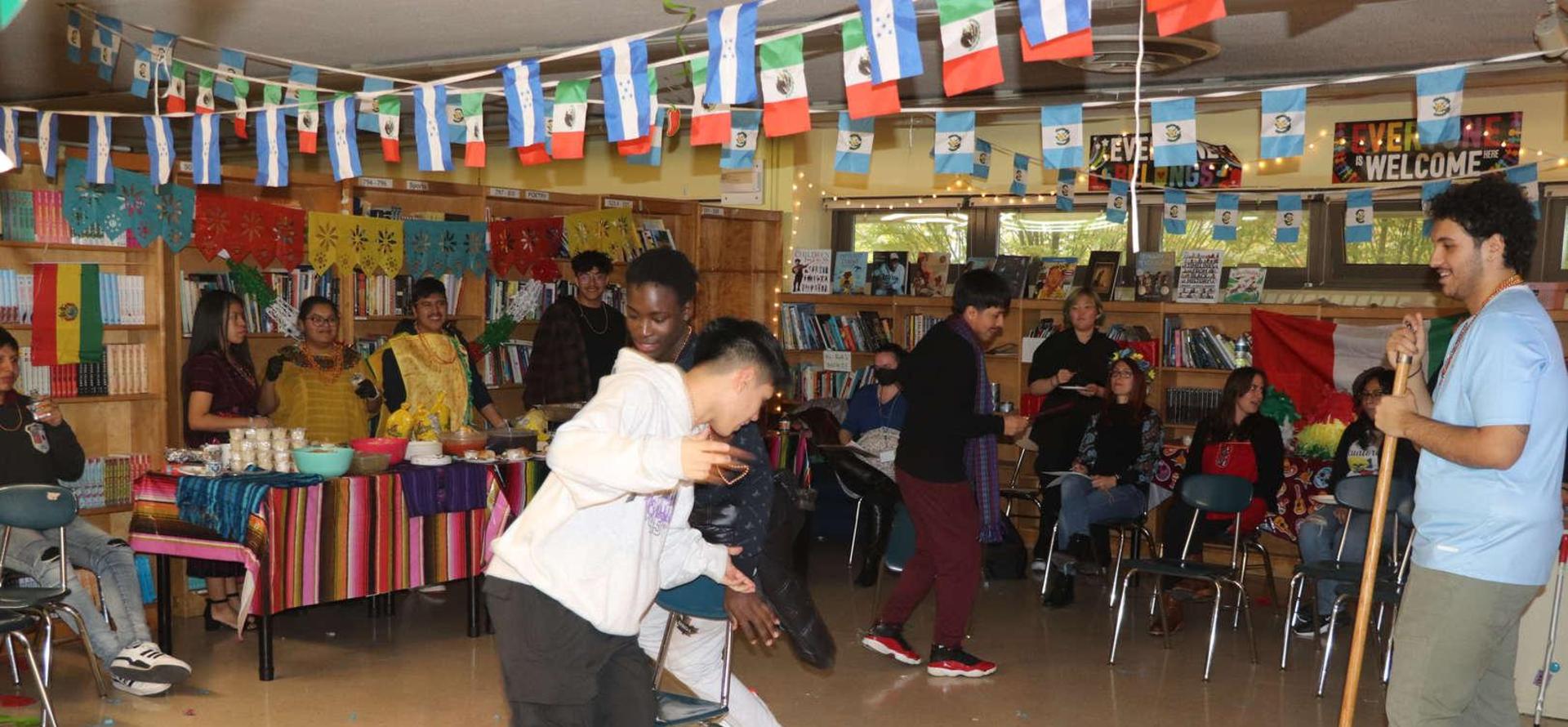 People dancing and celebrating in a vibrant community event.