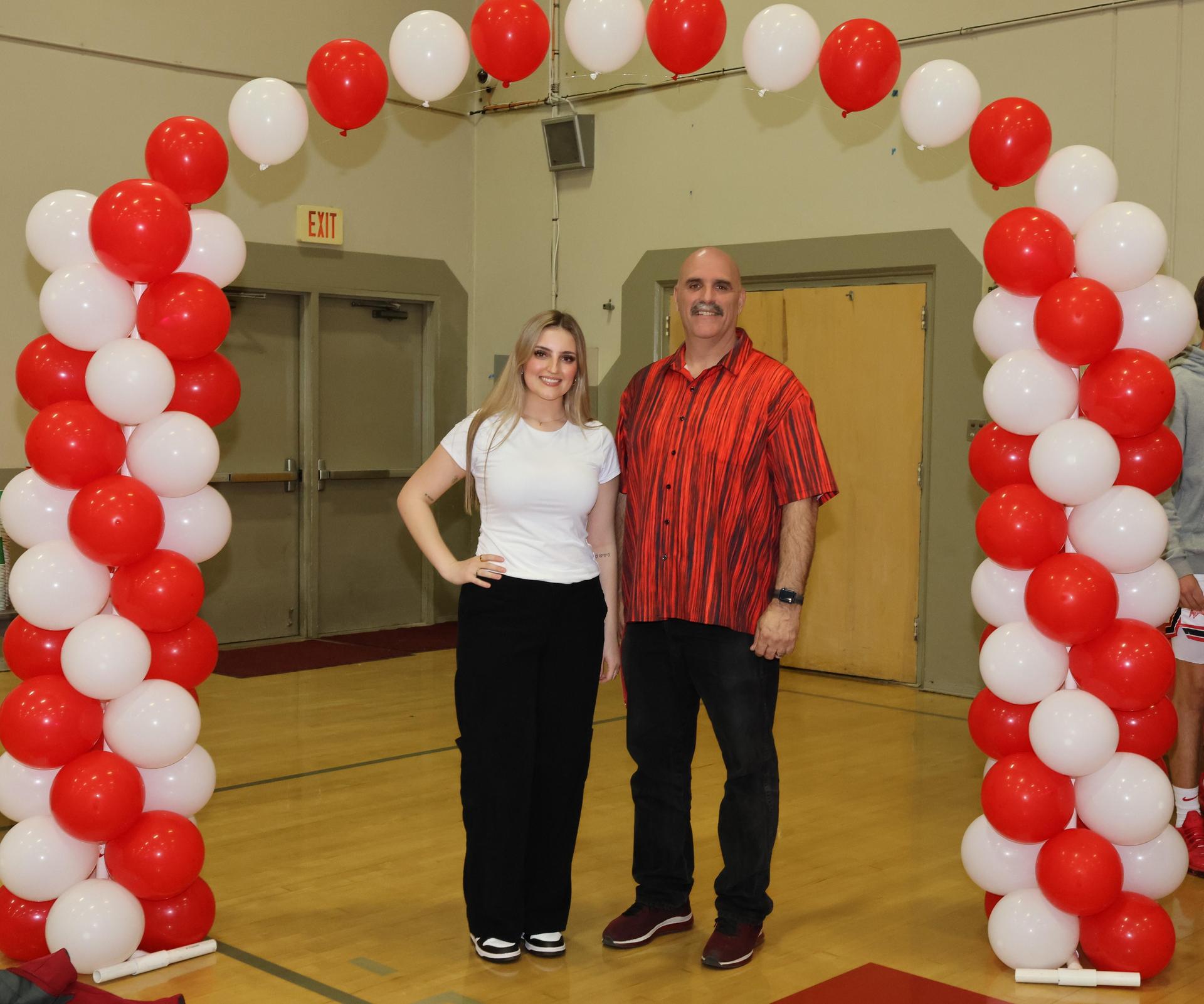 varsity basketball coaches posing