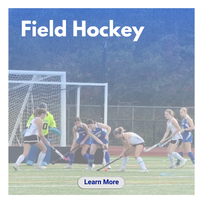 Field Hocky players battling for a ball