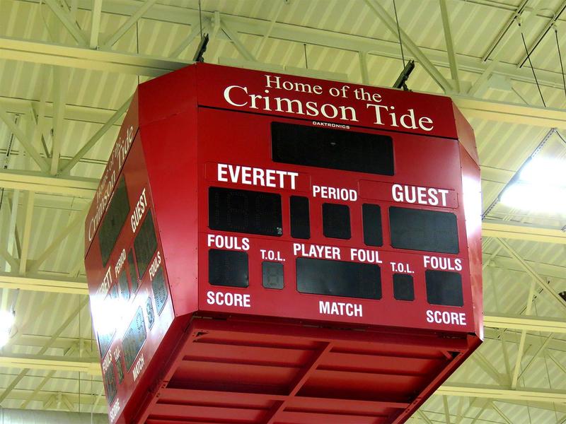 The scoreboard hanging from the ceiling inside the EHS gymnasium