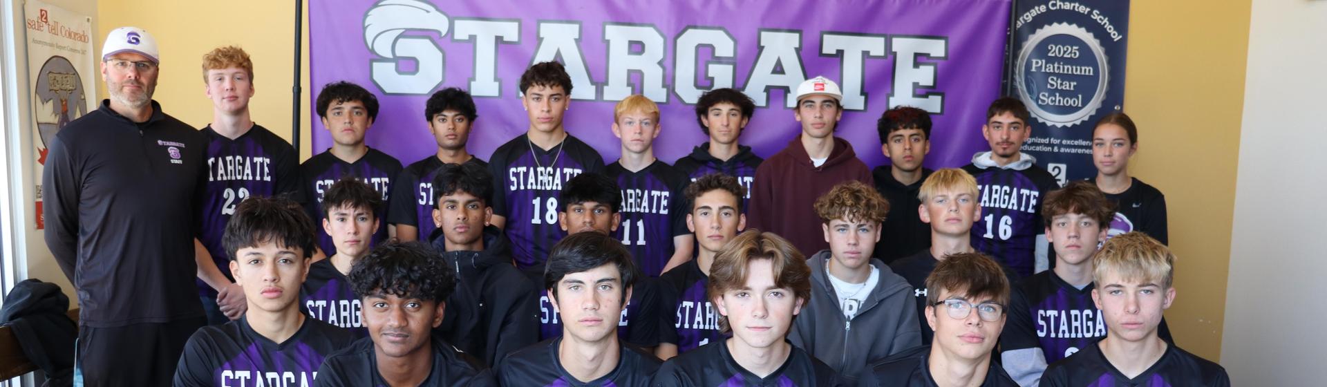Group photo of a high school soccer team, featuring players in black and purple uniforms.