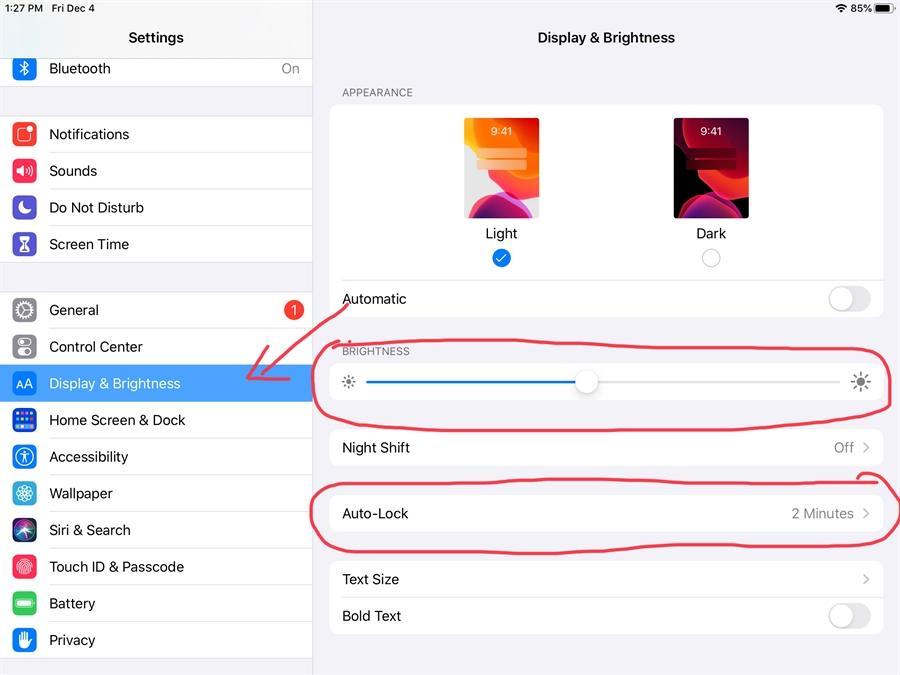 Settings menu showing Display & Brightness with brightness slider and options.