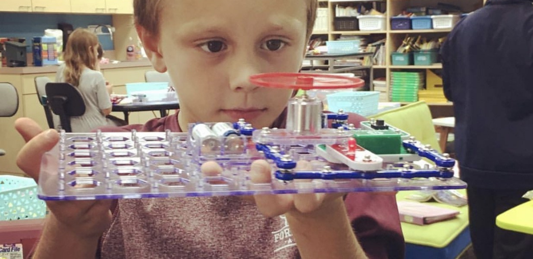 student experimenting with circuits