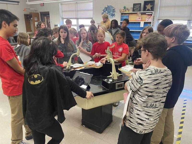 Clarkdale High students brining science to life with a Halloween anatomy lab for CES 5th and 6th graders.