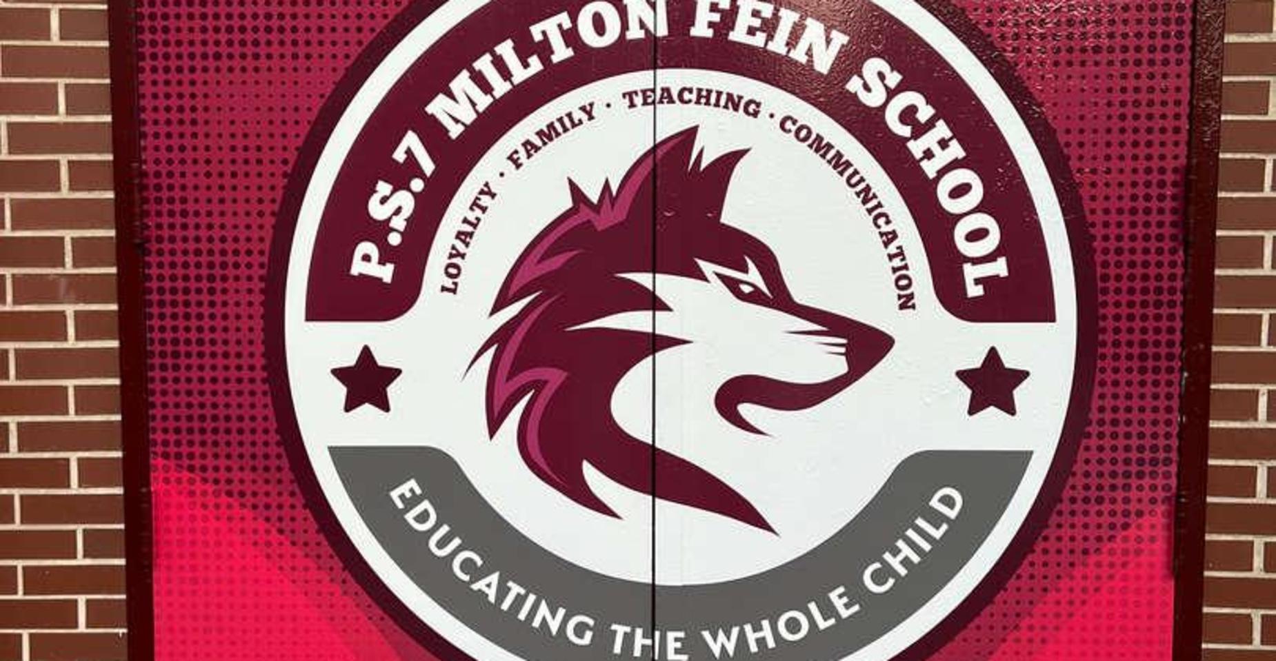 School logo featuring a wolf and the text about education.
