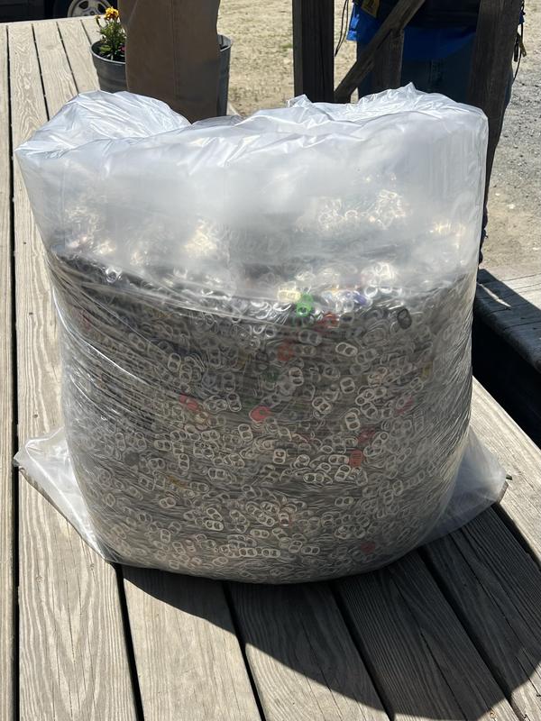 Bag full of can tabs collected by Mohawk Ramblers