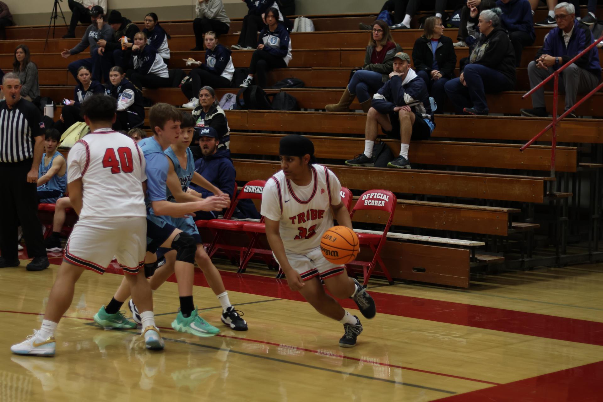 junior varsity boys playing basketball against yosemite