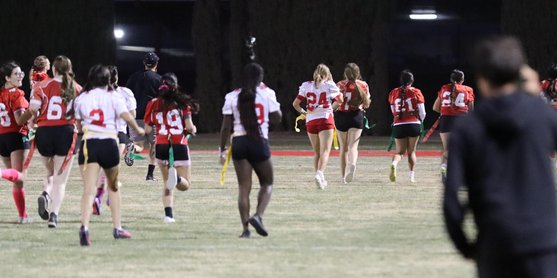 girls playing flag football
