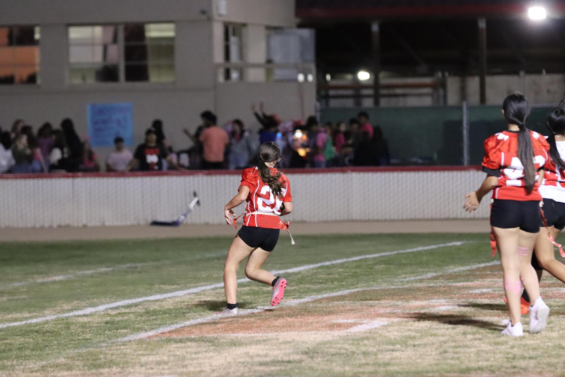 girls playing flag football