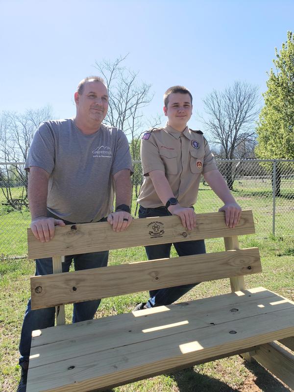 Butch and Charlie with a bench