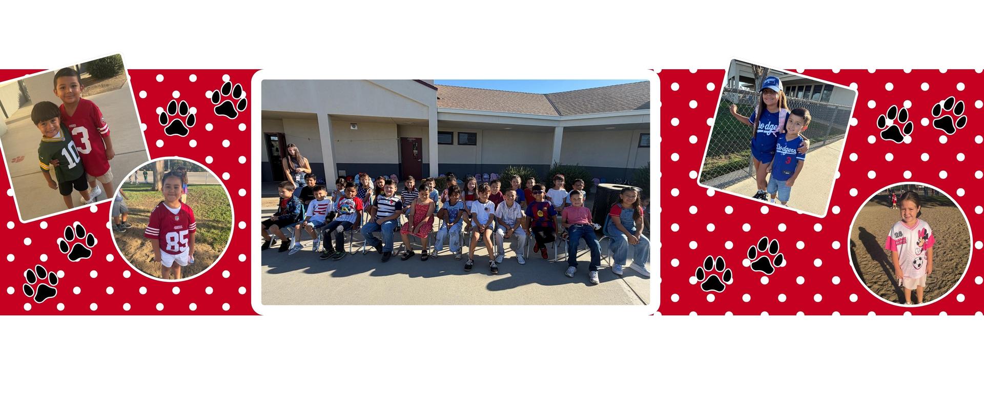 A group of children in red and blue jerseys posing outside a school.