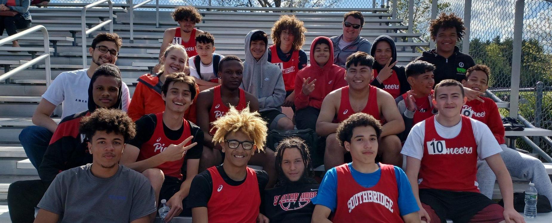 Students at a high school game in Southbridge Pioneers shirts