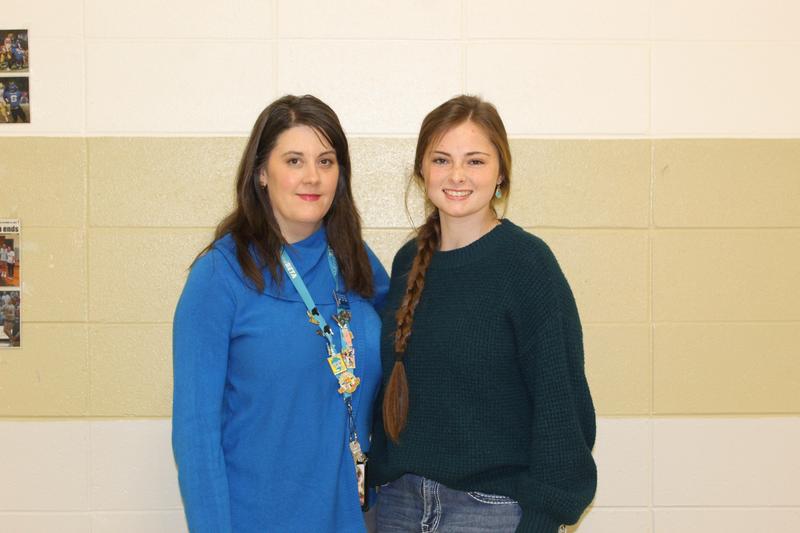 Ethel High School STAR Student Addison Stubbs stands beside STAR Teacher Mrs. Julie Harman, both smiling in a school hallway.