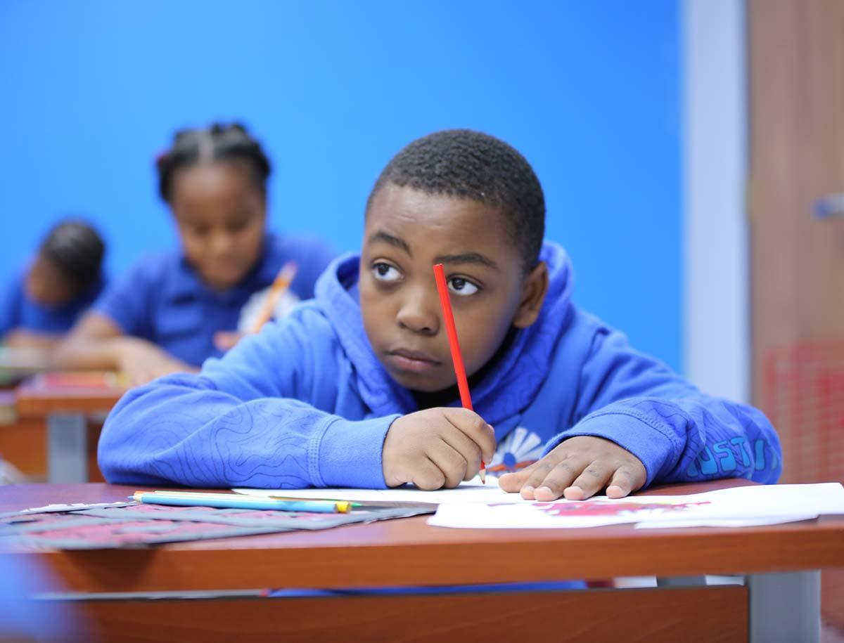 Horizon Science Academy Dayton Elementary student writing in class