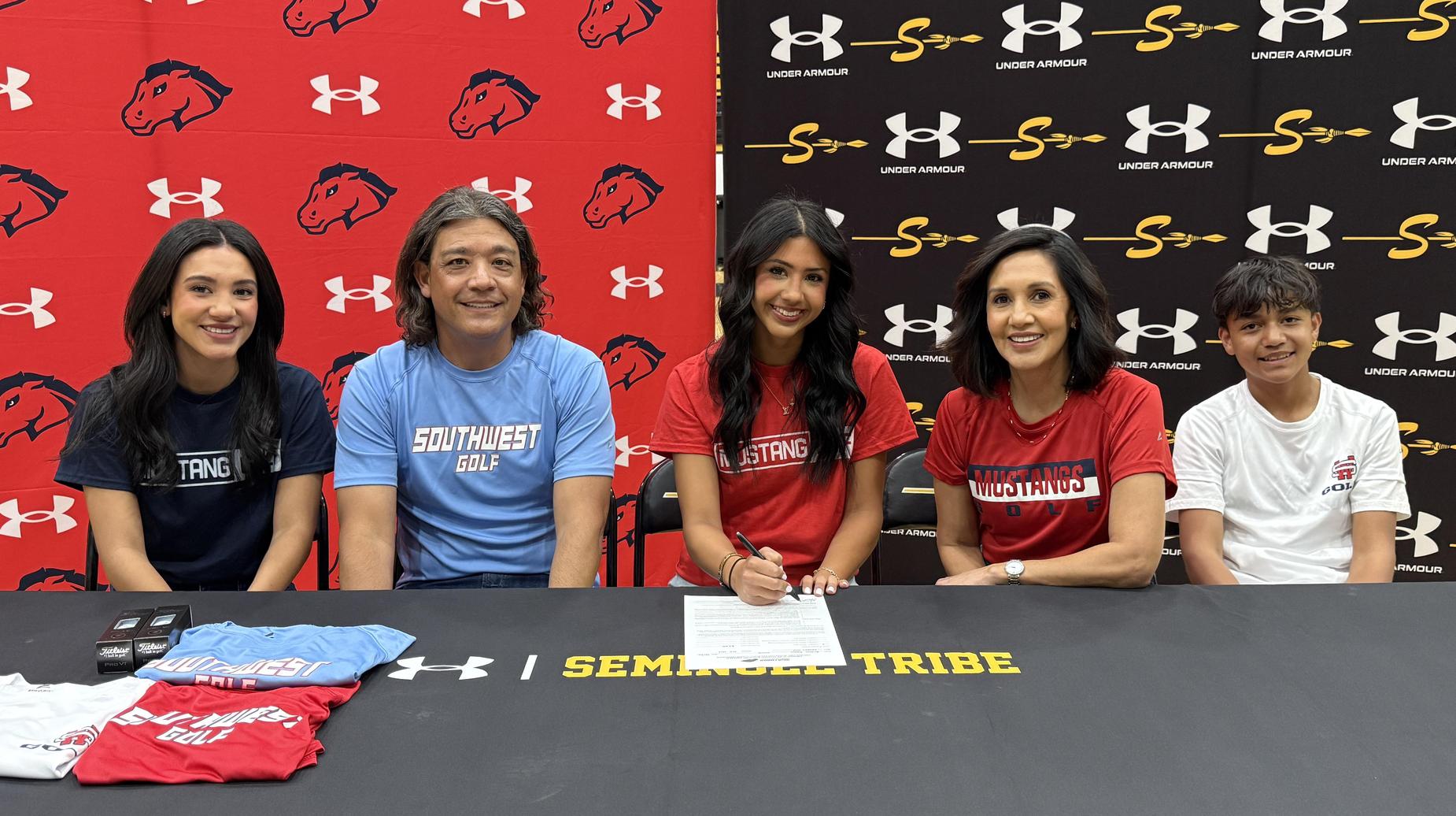 Karoline Franco signing her letter of intent to play golf at the University of the Southwest in Hobbs