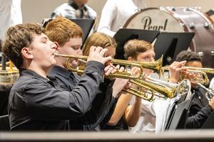 the 7th grade band performs
