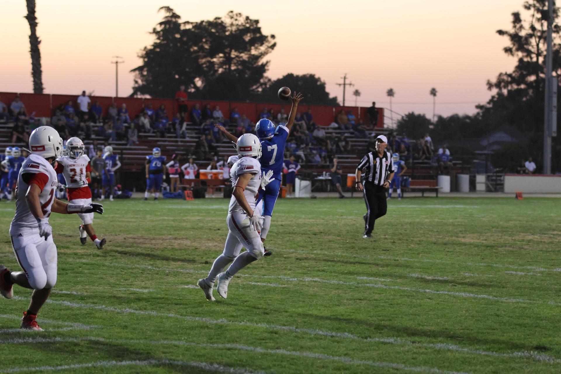 Junior Varsity football players in action against Caruthers