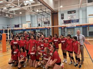 girls volleyball team after winning championship game