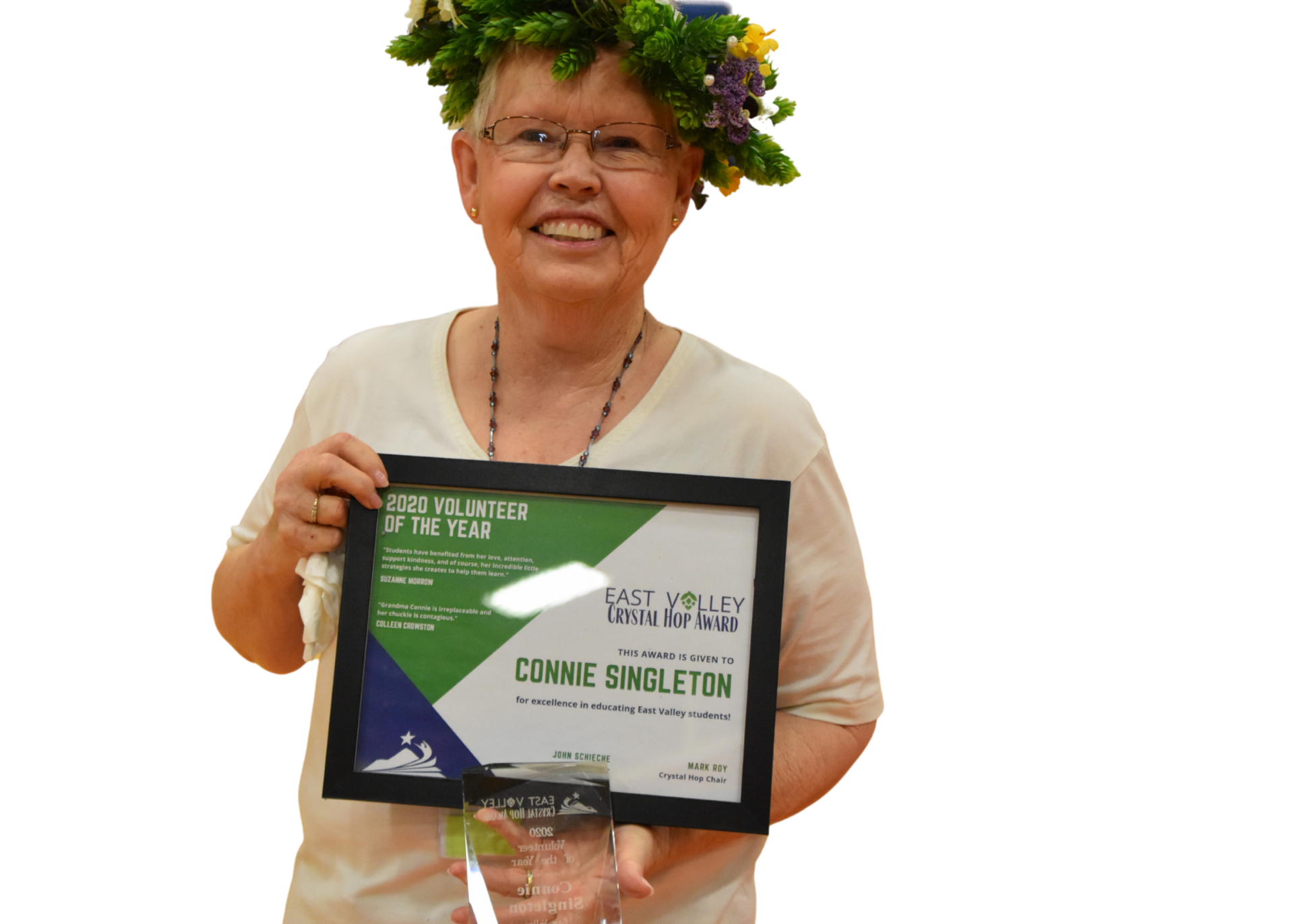 Connie Singleton wearing hop crown and holding hop plaque.