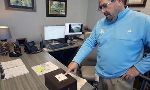 Principal Luker in his office
