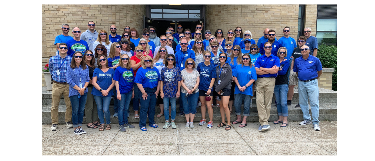 secondary staff wearing sunglasses and Bloomfield tshirts