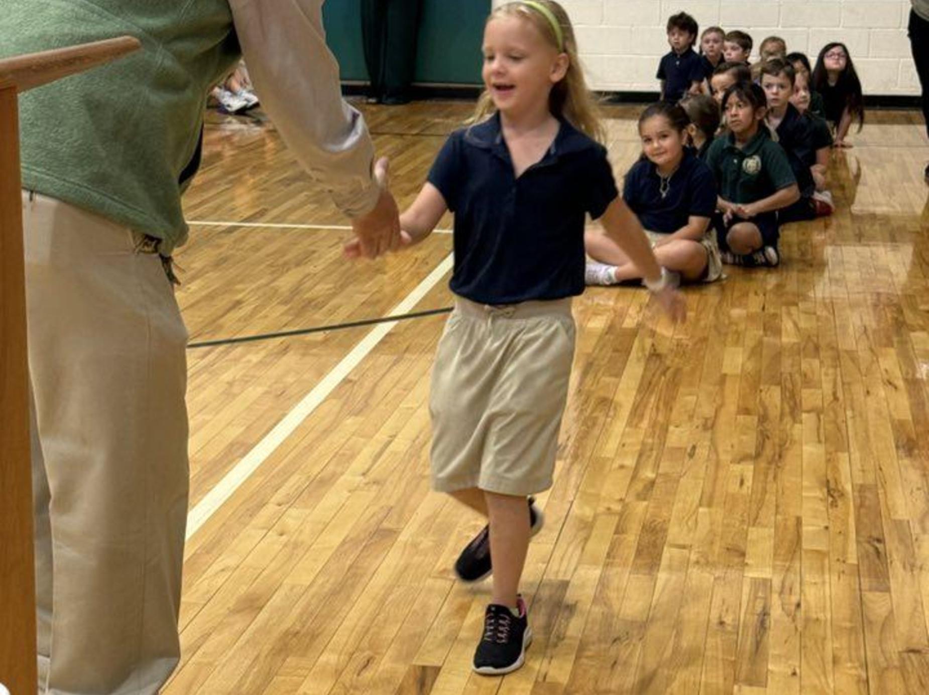 Student receiving an award