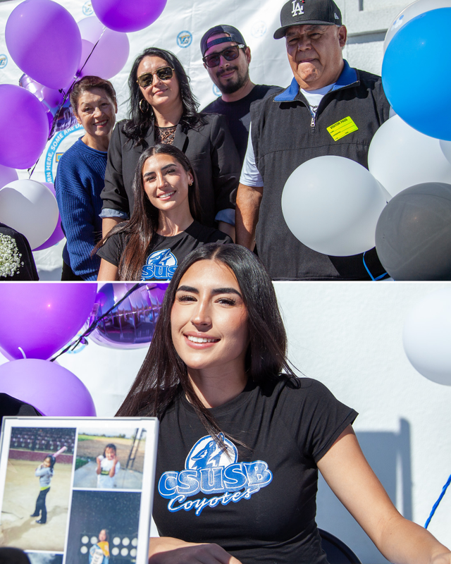 Group of four smiling individuals with balloons celebrating a special occasion.