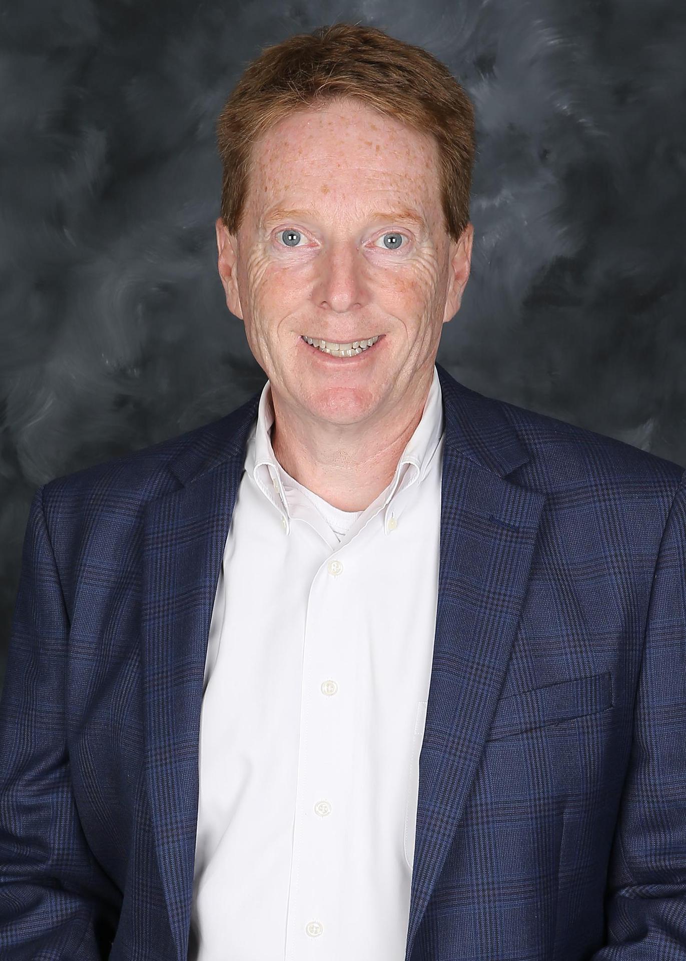 Headshot of Jim Nash.