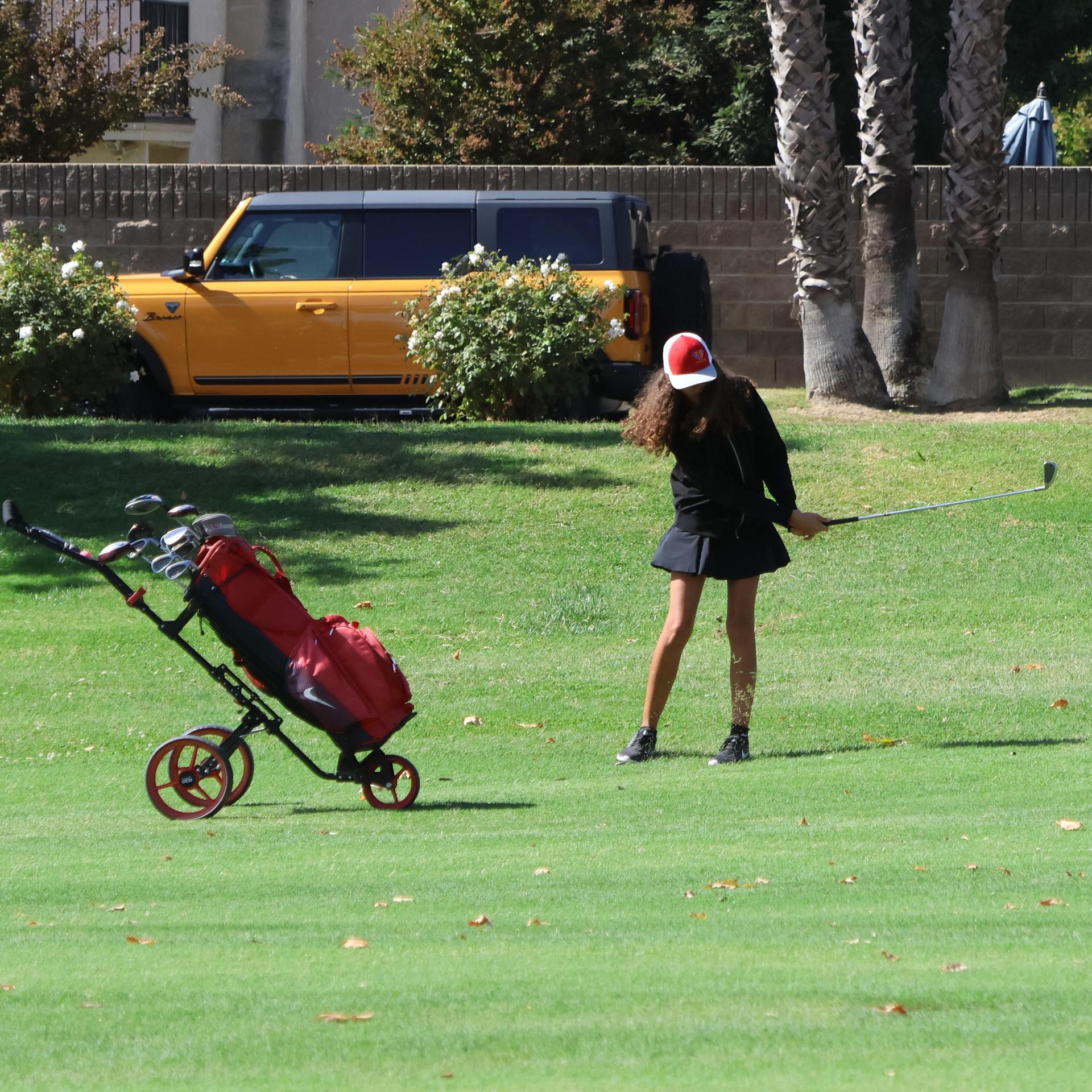 Girls golfers in action at the championships