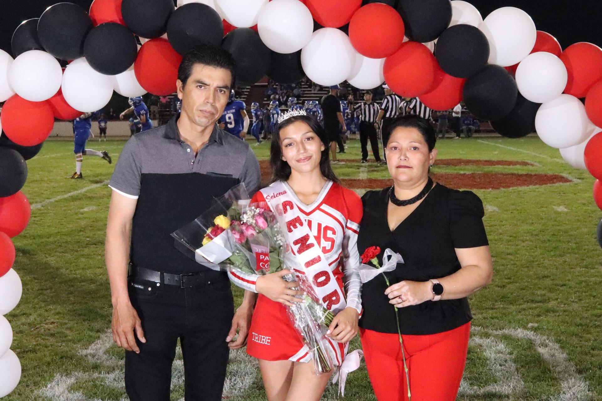 seniors and their escorts celebrating senior night