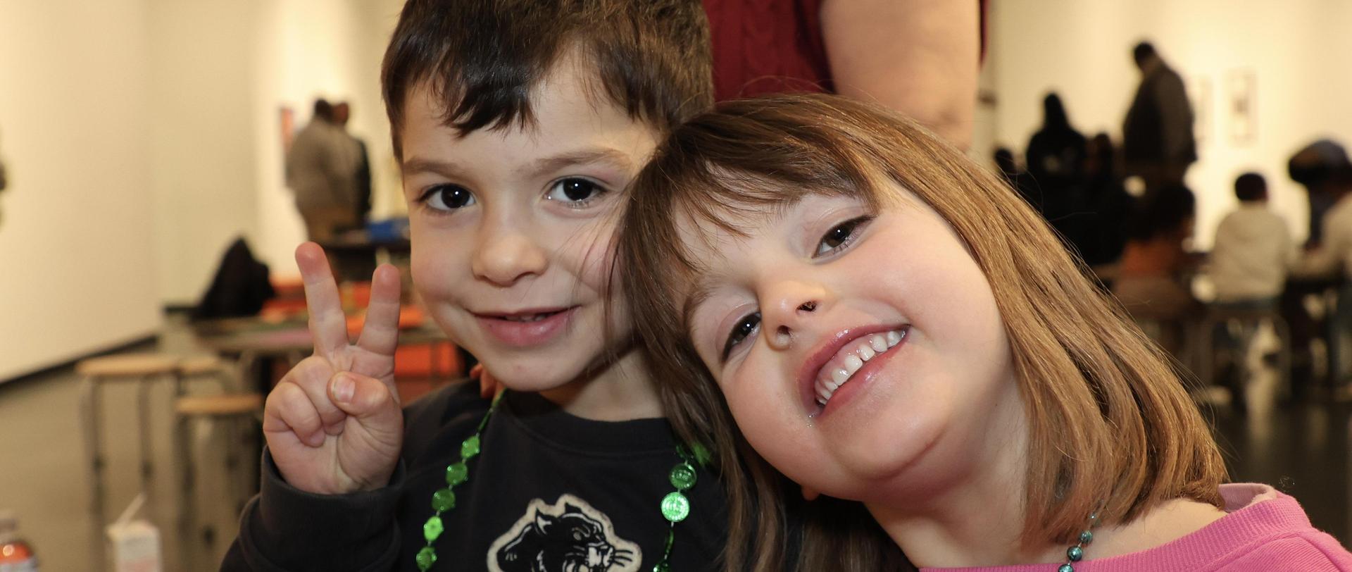 Two children smiling