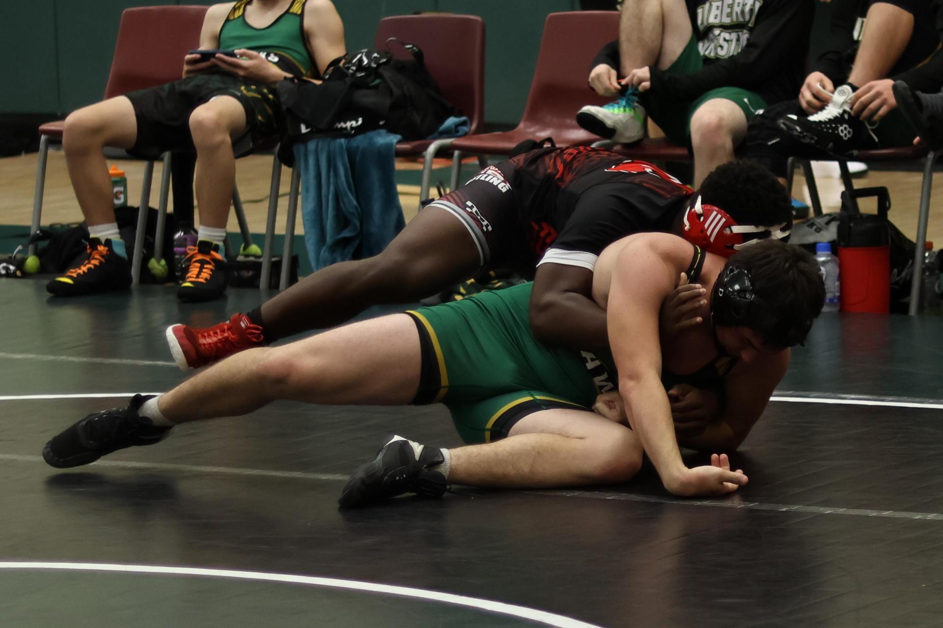 boys wrestling at liberty duals