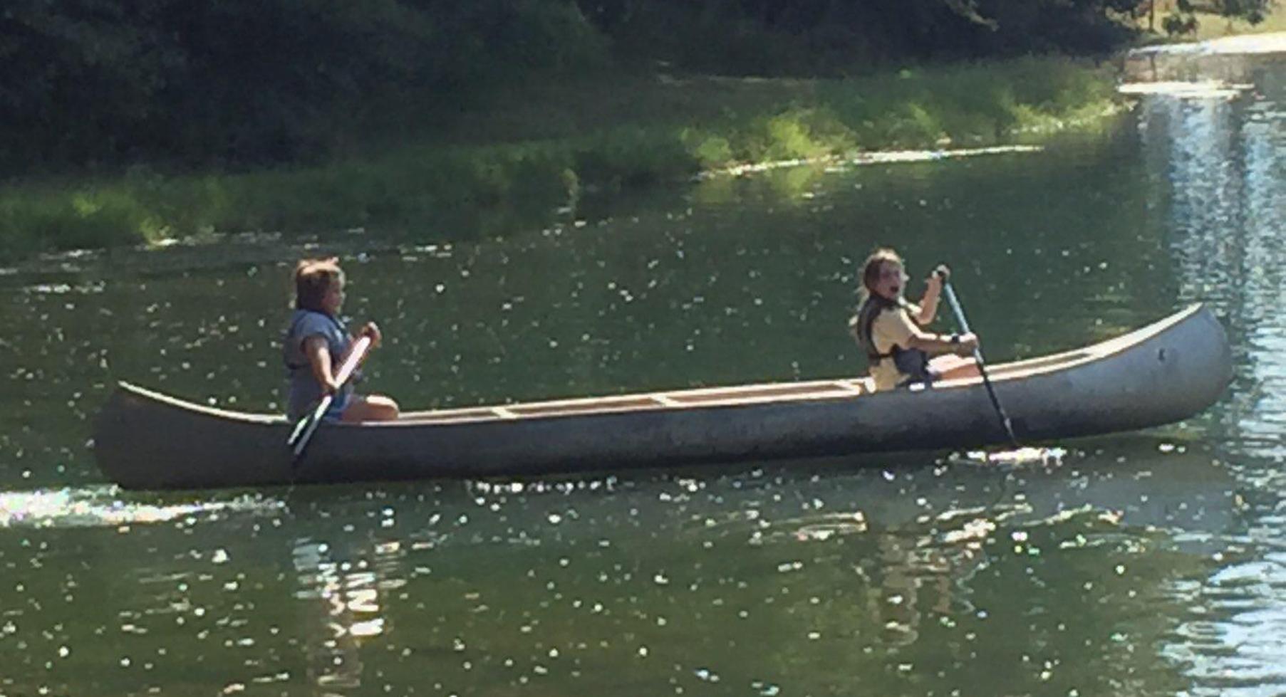 Students in a canoe.