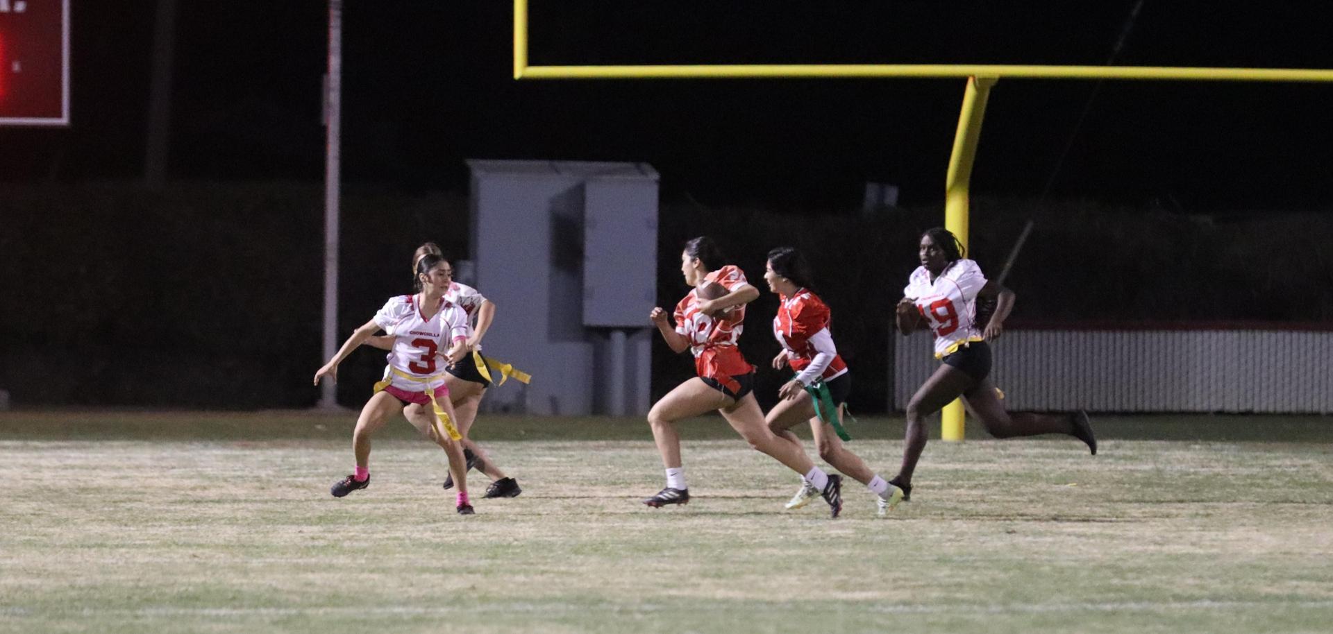 girls playing flag football