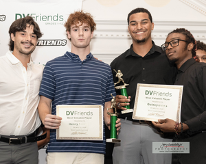 Student Receiving award from Coach