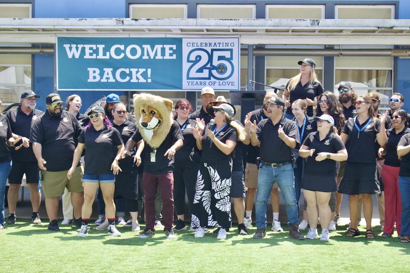 High School staff with Lion Mascot