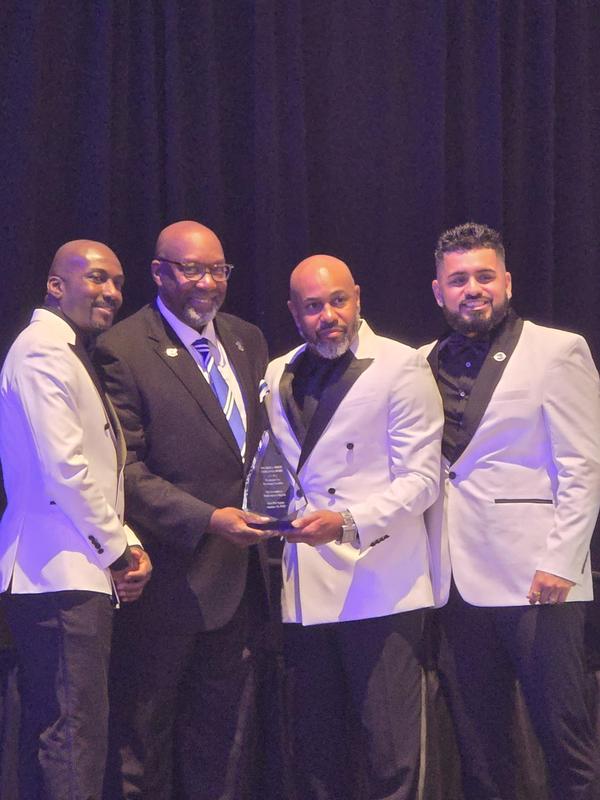 Picture of Mr. Franklin with his sorority brothers.