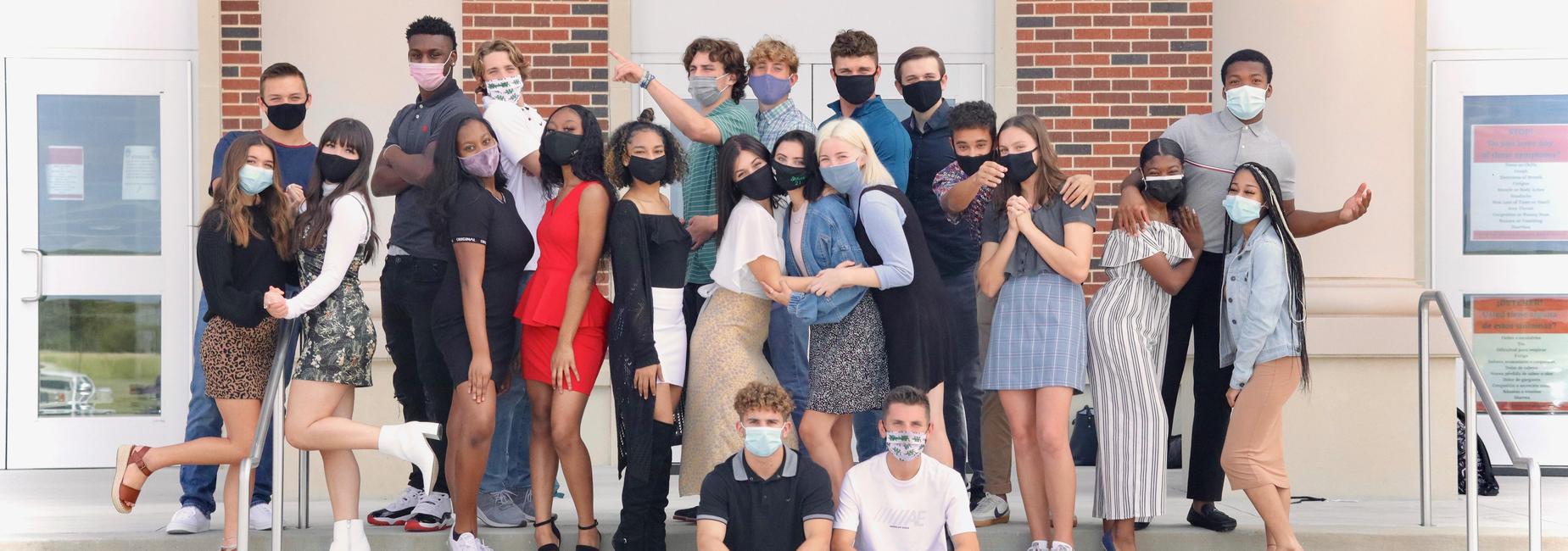 large group of students on the campus entry steps