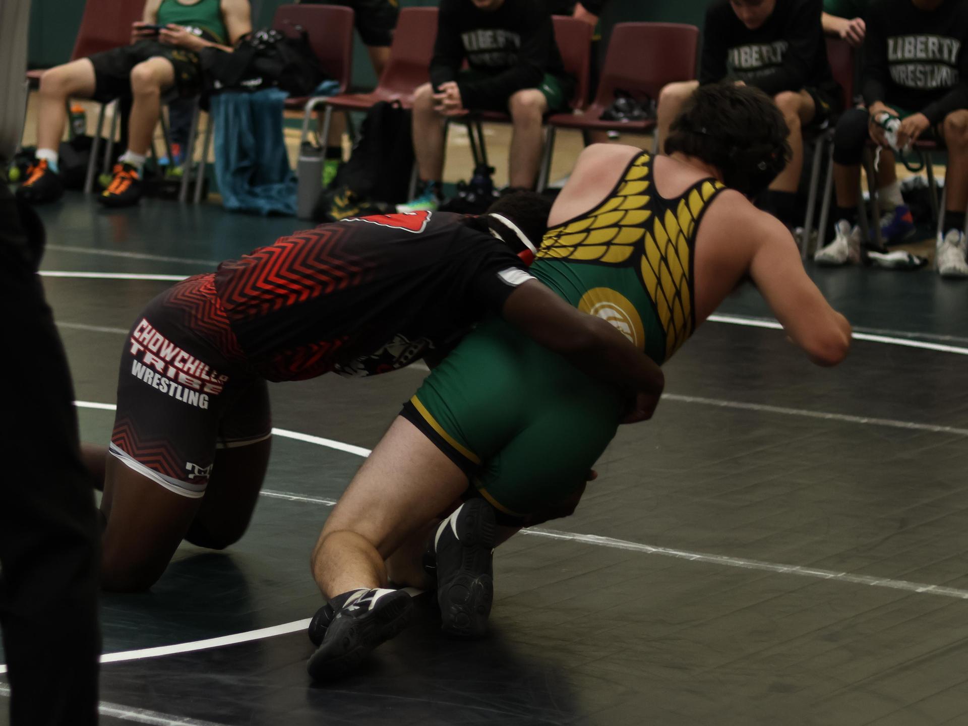 boys wrestling at liberty duals