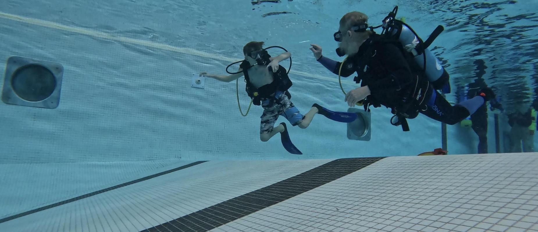 Student learning to scuba dive