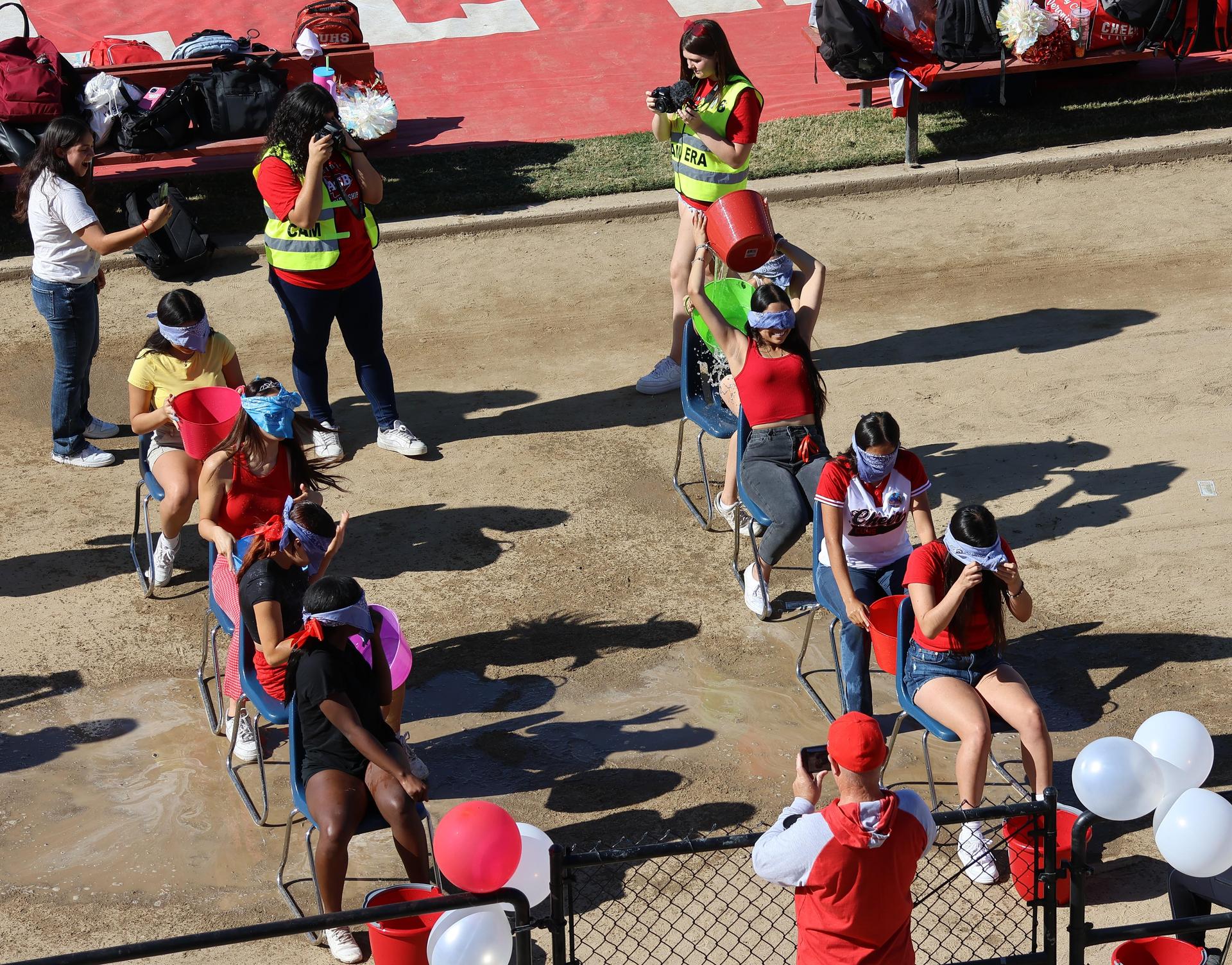 students and staff at the homecoming rally