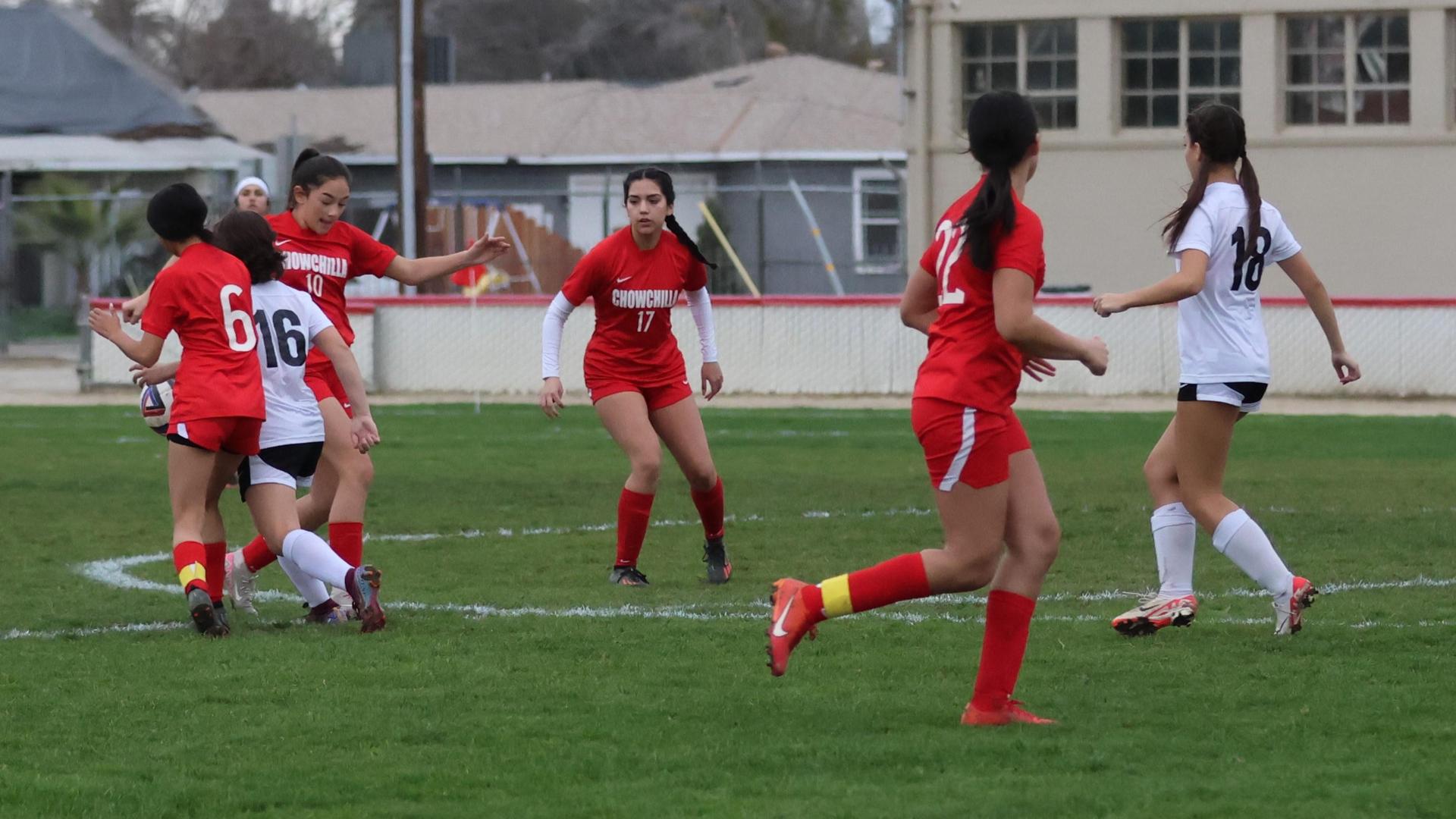 Junior Varisty girls playing soccer against liberty
