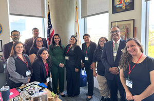 ECE team and parents pose for a photo with CA Assemblywoman Blanca Rubio