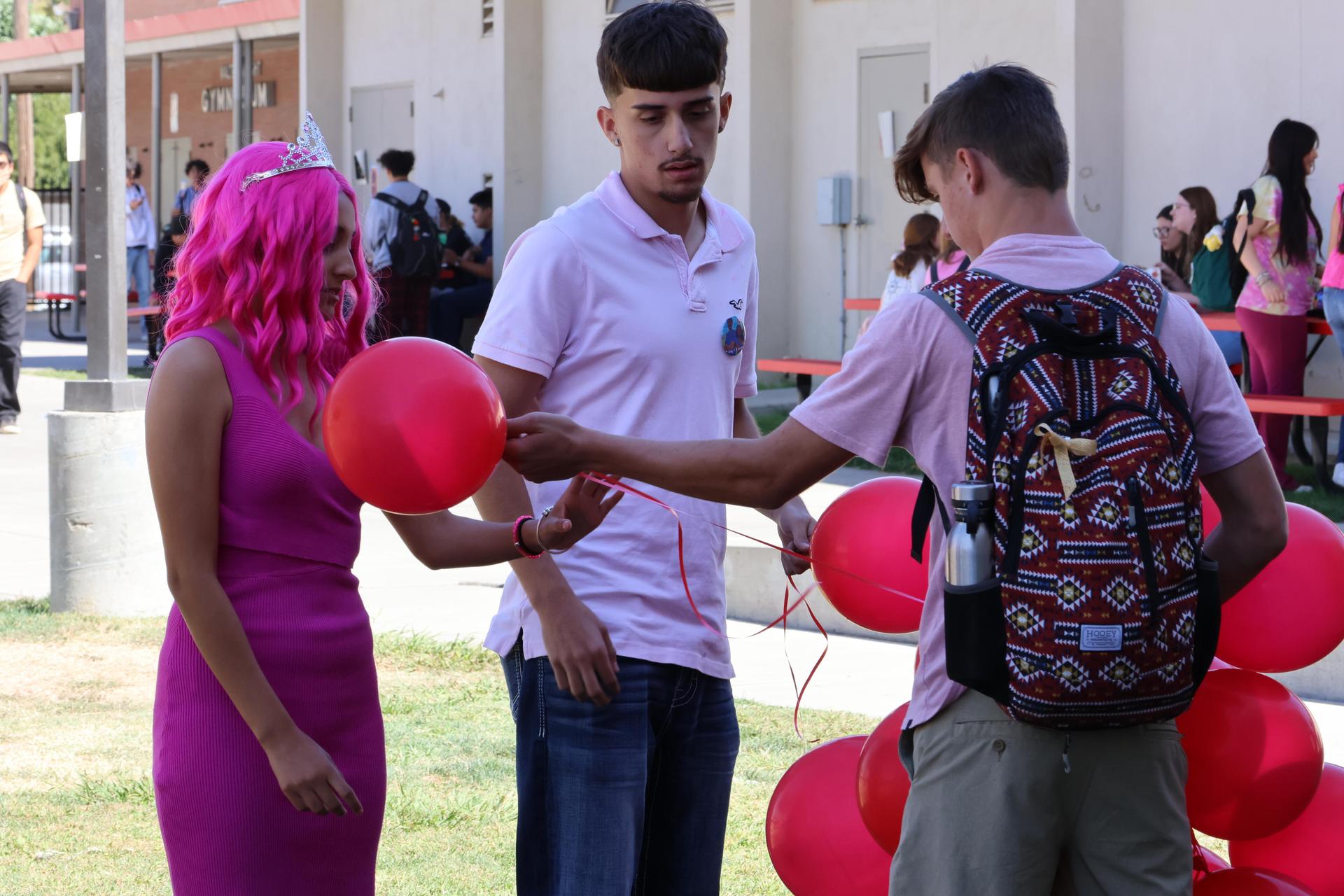 students dressed in pink to show school spirit