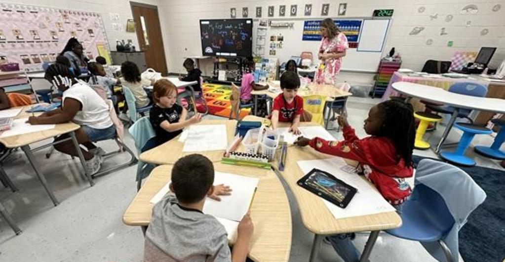 Math lesson taking place in a first grade classroom