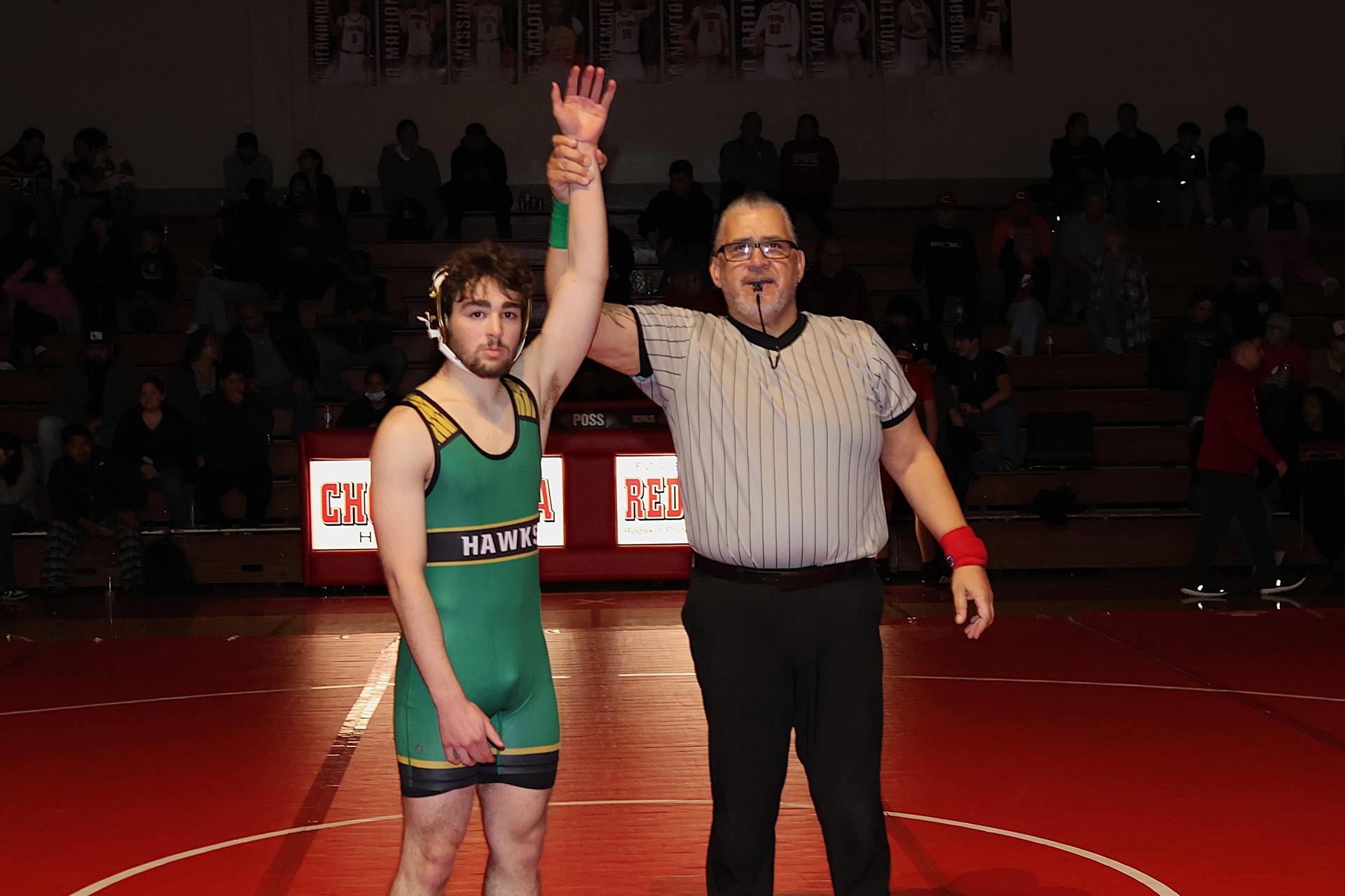 Wrestling winners with hands up 88