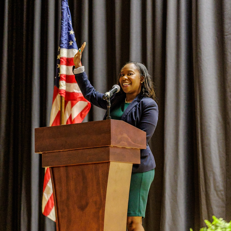 Dr. Chisolm waves to crowd