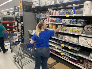 A first-year teacher shops for supplies for her classroom