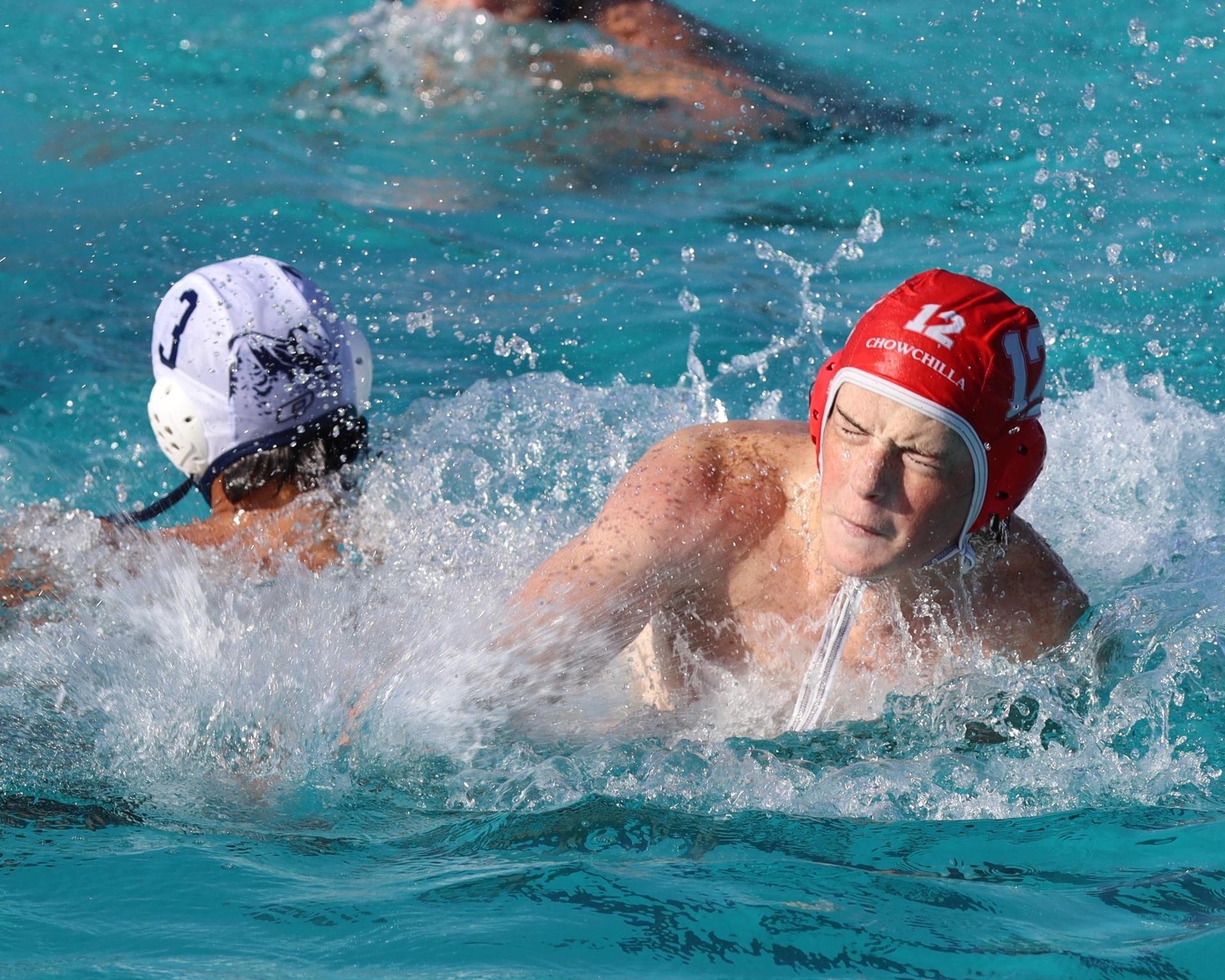 Boys playing water polo against Yosemite