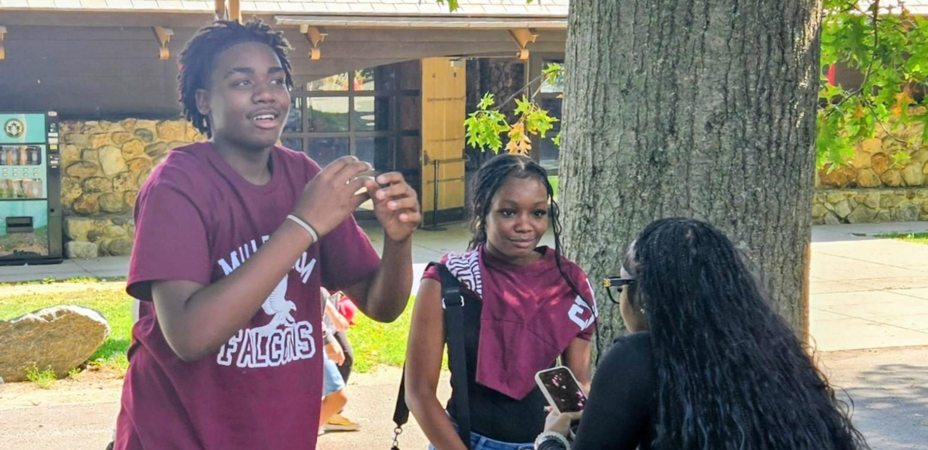 Students pose for community building trip.